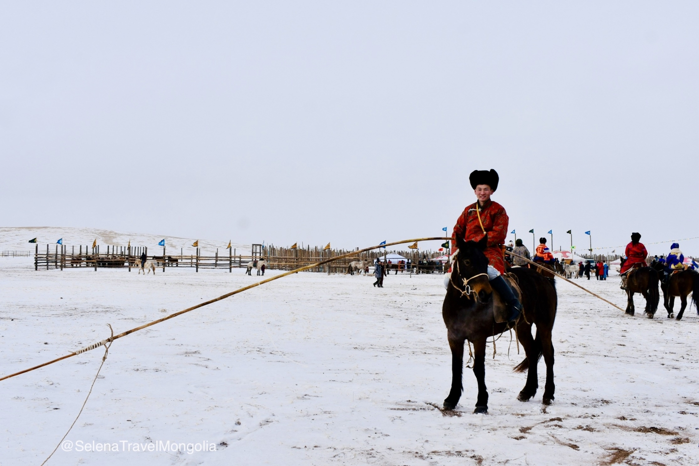 Young nomad at Taliin Tumen Aduu - Winter Horse Festival in Mongolia 